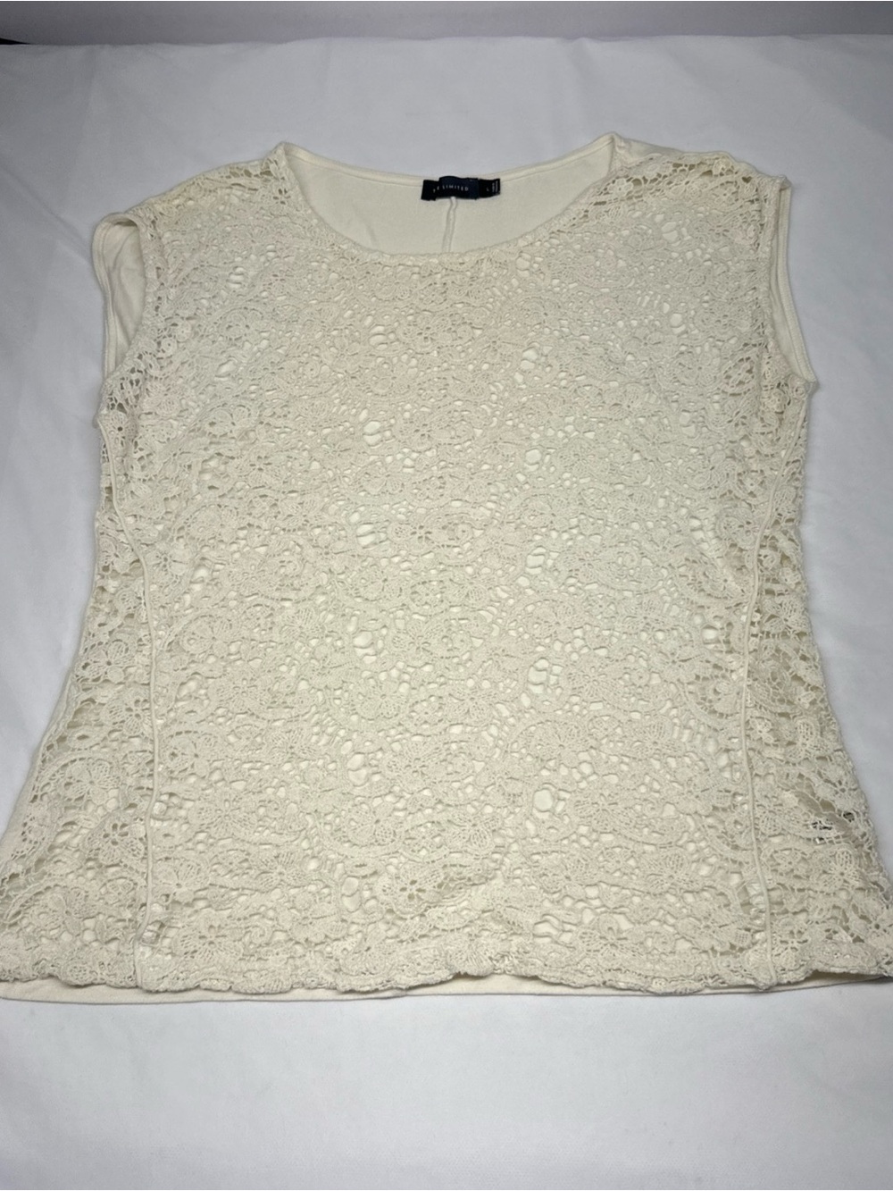 the limited sleeveless top large Quilted